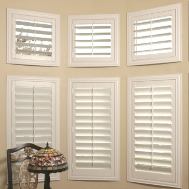 Sunburst shutters on a Fort Lauderdale bay window