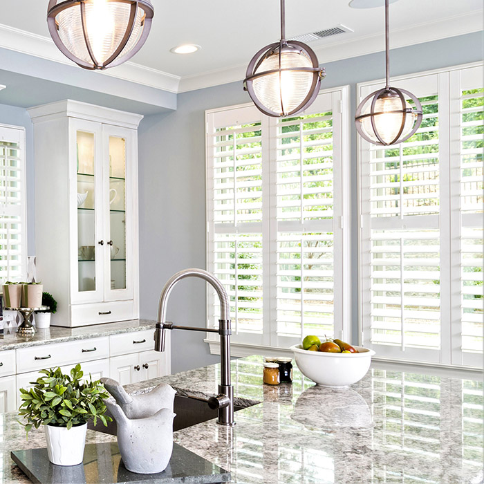Specialty shaped windows with plantation shutters