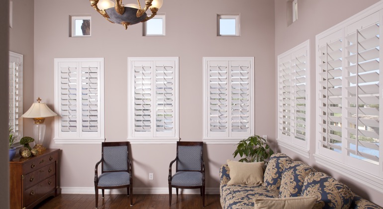 Chic parlor with casement shutters