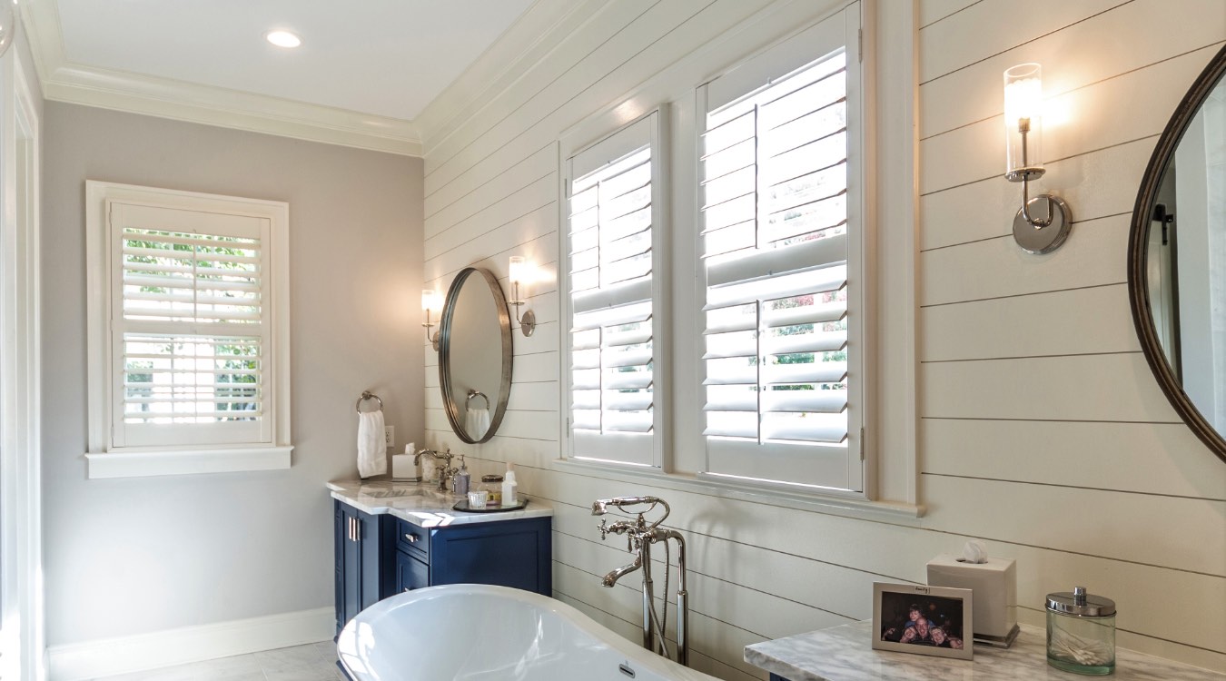 Fort Lauderdale bathroom with white plantation shutters.