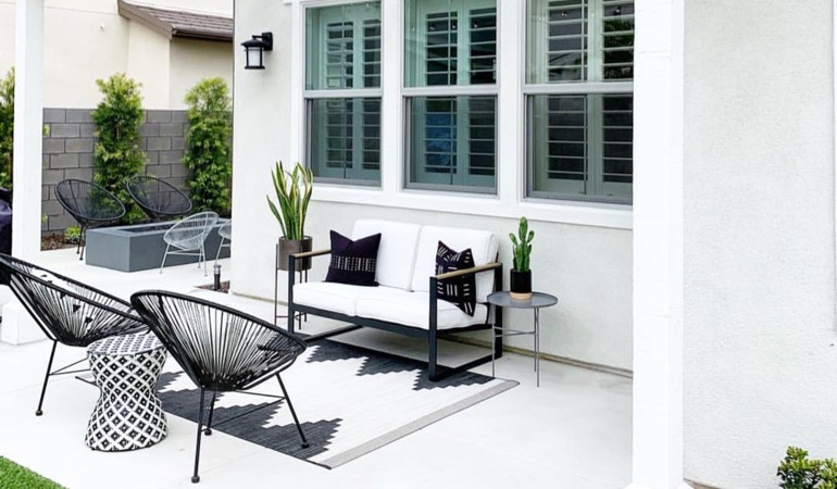Spending a little time mulching and weeding can provide you with an outdoor oasis. An outdoor with plantation window treatments