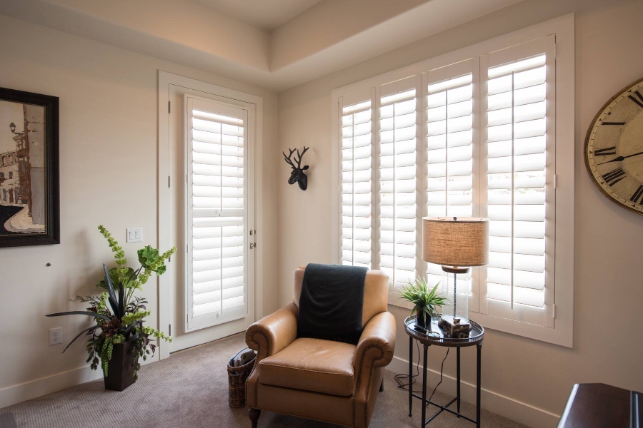 White shutters in a corner of a living room