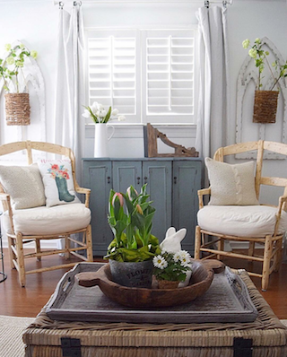 White shutters in breezy sunroom.