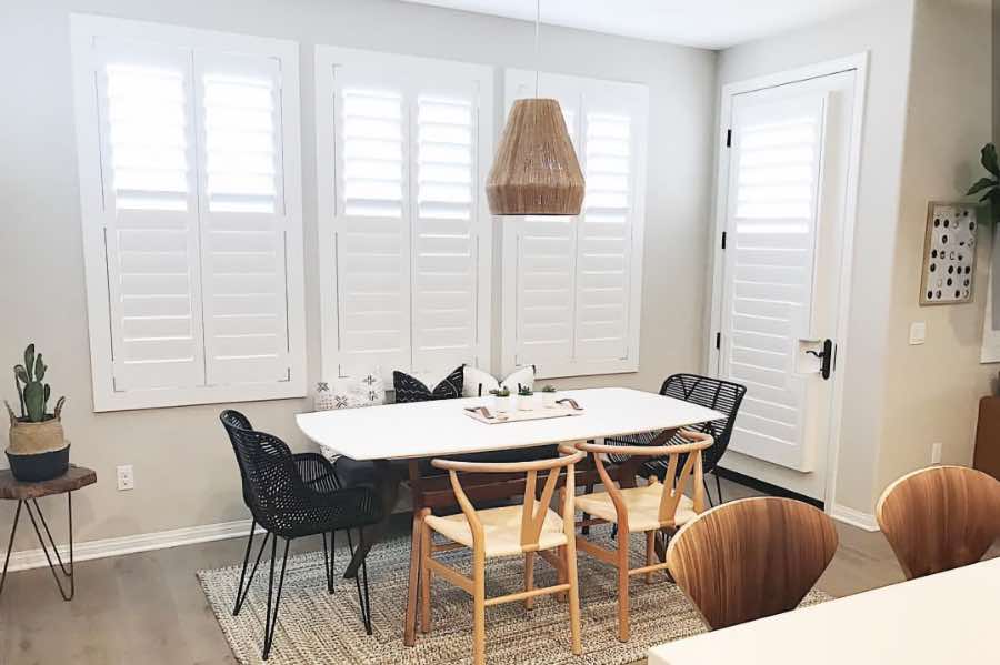 Use Polywood shutters to control natural light levels in your Fort Lauderdale dining room. Polywood shutters with top louvers tilted open in a dining room