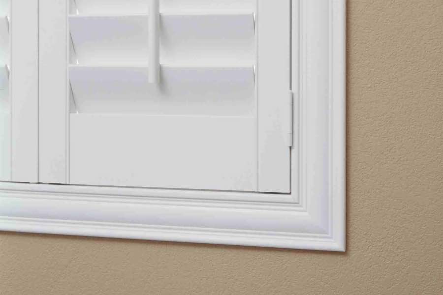 Your Sunburst window treatment consultant can show you how L-frames and Z-frames fit on your window. Close up of a Polywood shutter Z frame