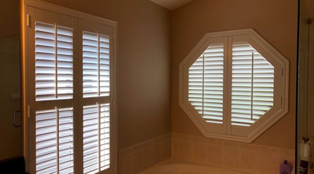 Octagon window treatments Octagon window in a Fort Lauderdale bathroom