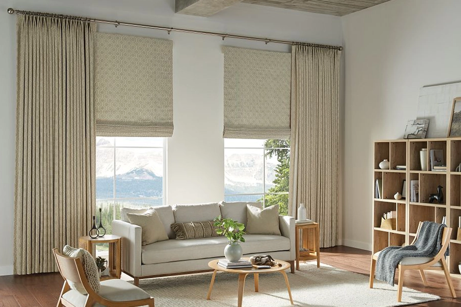 Beige draperies in a large dining room with farmhouse styled decor