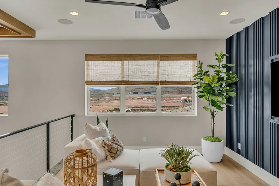 Fort Lauderdale homeowners who want eco-friendly home fixtures should consider natural woven shades. Natural brown woven shades on a window in a stylish sitting area