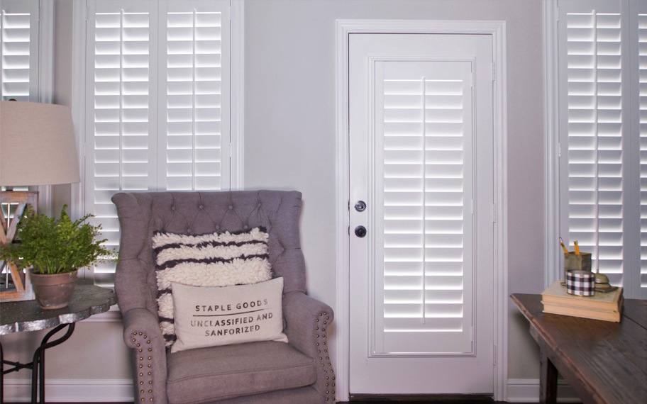 Interior shutters are beautiful and durable window treatments for glass doors in Fort Lauderdale. Polywood shutters on a door